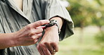 Smart watch, fitness and man in park, hands and exercise with progress, nature and wellness. Closeup, outdoor and healthy person with break, heart rate and app to monitor training and check time