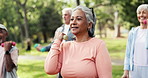 Fitness class, old woman and exercise outdoor with dumbbell for joint health, mobility and wellness. Group, elderly person and breathe in park with weights for workout, physical therapy and strength.