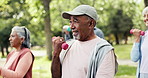 Fitness class, old man and exercise in park with dumbbells for joint health, mobility and wellness. Active, elderly person and happiness outdoor with weights for group, workout and strength training.