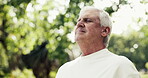 Senior man, breathing and meditation outdoor for fitness, fresh air and spiritual healing. Elderly person, bokeh and inhale exercise for inner peace, holistic balance and mindfulness practice at park