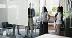 Business people, creative team and planning with whiteboard in office for brainstorming ideas. Group, employees or discussion with staff for project schedule, agenda or work delegation in workplace