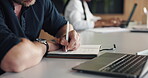 Man, hands and writing in office with diary for marketing campaign schedule, reminder or laptop. Creative, person and coworking with computer for planner notes, advertising calendar or task priority.