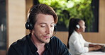 Call center, advice or man in office with headset, lead generation or outbound contact in crm management. Telemarketing, coworking or agent with tech, customer service or feedback in help desk