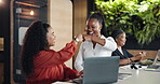 Laptop, business women and fist bump for success, well done and celebration with friends in office. Computer, achievement and happy team with goal, collaboration and target in creative startup