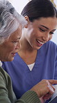 Home, old woman and nurse with tablet, smile and help with communication, advice and wellness. Apartment, caregiver and mature person with discussion, tech and app for patient info and healthcare