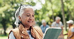 Volunteer, tablet and old woman in park, donation and community service with internet. People, outdoor and tech with social responsibility, connection and digital app for schedule and food charity