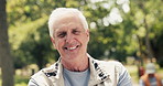 Face, volunteer and mature man with smile for community service, non profit or laugh in park. Portrait, charity worker and person outdoor for NGO, outreach or funny manager with social responsibility