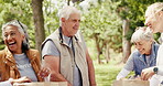 Volunteer, teamwork or packing donations at park for food drive, charity event or community outreach. NGO project, senior people or laugh with parcel boxes in nature for nonprofit service or activism