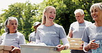 Volunteer, walk or team in park with donations, social chat or collaboration in relief campaign. Stroll, laughing or people outdoor with crate, connection or distribution in charity project.