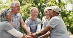 Volunteer, people and stack hands for celebration, success or community service mission in park. Mature team, huddle and charity workers with NGO goal, non profit milestone or excited with motivation