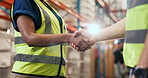 People, logistics and supply chain with handshake in warehouse for distribution service. Closeup, colleagues or distributor shaking hands with coworker for partnership, stock control or storage depot