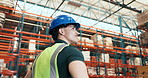 Man, thinking and shipping at warehouse for storage, logistics or inspection with low angle. Person, technician and insight with perspective for safety check, inventory management and distribution