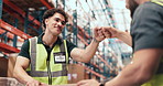 Man, fist bump and team with logistics at warehouse, boxes and happy with low angle for celebration. People, engineer and excited with goals, success or achievement with support for supply chain