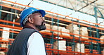 Black man, thinking and helmet at warehouse for storage, logistics and inspection for supply chain. Mature person, technician and perspective for safety check, inventory management and distribution