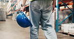 Helmet, man and walking for logistics in warehouse for inspection, quality control and supply chain. Person, storage or start for export, inventory management and supervisor of cargo distribution