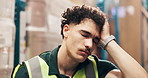 Frustrated man, logistics and headache with stress in warehouse for supply chain fail or mistake. Tired, male person or distributor with migraine, fatigue or burnout for overworked strain in depot