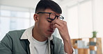 Eye strain, glasses and headache with man in office for burnout, stress or deadline. Brain fog, eyewear and pain with frustrated employee in creative agency for fail, mistake or fatigue for crisis