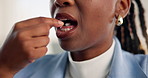 Black woman, mouth and water with pill for medication, healthcare or wellness in office. Closeup, female person or employee drinking with mineral liquid or tablet for cure or antibiotic in workplace
