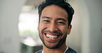 Property, face and man in house with confidence, fresh start and investment in dream home. Space, real estate and male person in living room with pride, relocation and achievement for new homeowner