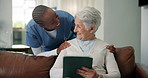 Conversation, hug or tablet with nurse and old woman on sofa in living room of home for streaming. App, smile or support with caregiver and senior person in apartment together for online subscription