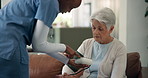 Nurse, old woman and blood pressure monitor on sofa for assessment, explain or hypertension in retirement home. Senior person, caregiver and show results with point, exam or healthcare test in house