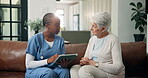 Consulting, medical or tablet with nurse and old woman on sofa in living room of home. App, conversation or healthcare results with caregiver and senior patient in apartment for feedback or review