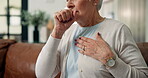 Hands, old woman and cough with chest pain on sofa with heart attack, breathing crisis and cardiac. Cardiovascular, senior person and discomfort in home with artery pressure and pulmonary emergency