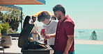 Men, talking and food with grill outdoor for cookout, social gathering and New Years party. People, friends and discussion with alcohol at barbecue event, prepare meal and hangout reunion in backyard