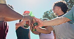 Friends, party and cheers with alcohol, outdoor and group on summer holiday, happiness and low angle. Social gathering, toast and people with beer for celebration, smile and drinking on vacation