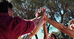 High five, people and friends with party, outdoor and bonding together with support. Low angle, men and happy women with social event, gesture and celebration with solidarity, community and mission