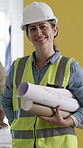 Blueprints, woman and face of civil engineer on site with confidence for project development. Happy, safety gear and portrait of female construction manager with drawings for infrastructure building.