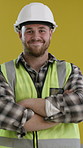 Crossed arms, man and face of civil engineer on site with confidence for project development. Happy, safety gear and portrait of male construction manager with pride for infrastructure building.
