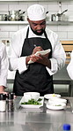 Chef, people and writing notes in restaurant kitchen for cooking food, recipe and culinary mentorship. Man, team and training in diner with notepad, conversation and meal prep advice for hospitality.