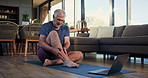 Old man, pain and legs with laptop, exercise mat and talk in living room with injury at home. Senior person, fatigue and burnout with muscle ache, inflammation or computer for virtual fitness class