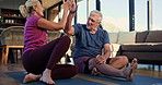 Yoga, high five and senior couple in morning for mindfulness, wellness and flexibility in home. Retirement, marriage and mature man and woman stretching for mobility, health and exercise together