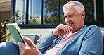 Reading, tablet and senior man in backyard for online news, website and notification for chat. Retirement home, happy and mature person on digital tech for contact, internet and subscription outdoor