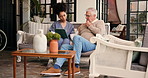 Elderly man, nurse and wheelchair with tablet for diagnosis, support or assisted living in home. Healthcare, caregiver and helping senior male person with a disability for health advice in house