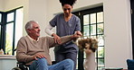 Help, stretching and caregiver with old man in wheelchair for mobility, health and wellness in home. Retirement, physical therapy and nurse with elderly person with disability for medical support