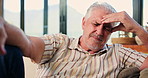 Senior man, headache and pain with stress on sofa for vertigo, strain or pressure in home. Elderly, male person or sore head with migraine or ache on couch for anxiety or old age in retirement house