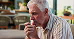 Senior man, thinking and sad on sofa in home with stress, mental health and worry in retirement. Elderly person with depression, anxiety or bad memory on couch, ptsd and reflection at apartment