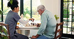 Chess, mature man and caregiver with board game for strategy, challenge and checkmate. Solution, decision and elderly person with nurse for cognitive skills, tactics or win in retirement home