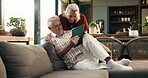 Tablet, conversation and senior couple on sofa with planning for retirement vacation together in home. Talking, technology and elderly people in living room with booking flight tickets in house.