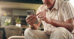Hands, old man and scroll with phone at house for browsing website, social media and message update. Smile, senior person and mobile app for reading blog, download games and notification for texting