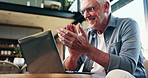 Happy, laptop and success with old man on sofa for mortgage payment, retirement funds and planning. Online banking, digital invoice and winner with low angle of senior person in home for bonus