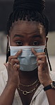 Black woman, face and vlogger with mask for protection, health and safety tips in home. Portrait, female person or influencer with protective wear in POV for online tutorial, help or advice in house