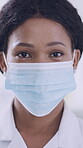 Scientist, face of woman and mask in laboratory for compliance, medical research or pathology. Pathologist, black person or safety for science experiment, vaccine innovation or ready for cancer study