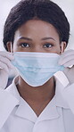 Scientist, face of woman and mask in lab for compliance, medical research or cure development. Pathologist, black person or safety for science experiment, vaccine innovation or ready for pharma study