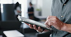Hands, tablet and business person with typing, website review and internet research in office. Accountant, worker and reading on digital technology for networking, planning and online communication