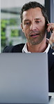 Phone call, talk and business man with laptop for deal, investment negotiation or feedback. Mobile, wealth manager or mature person with computer for financial update, offer or conversation in office