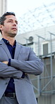 Arms crossed, vision and business man in city for real estate developer, reflection or morning commute. Urban property venture, low angle and travel with person thinking outdoor for realtor expansion